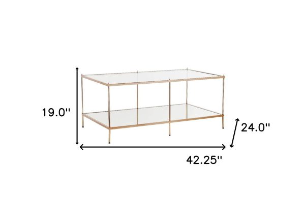 42  Clear And Gold Glass And Metal Coffee Table on Sale